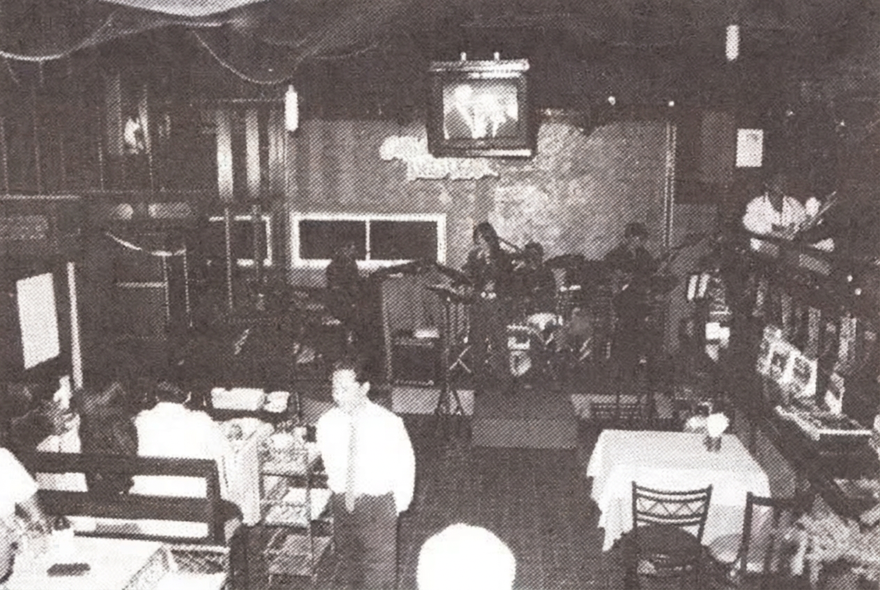Green Tree's dining room with a live band, from the archives